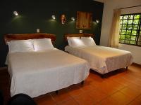 Toucan Casita bedroom with 2 queen beds
